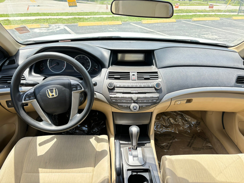 2012 Honda Accord LX interior – front seats and dashboard clean rental car