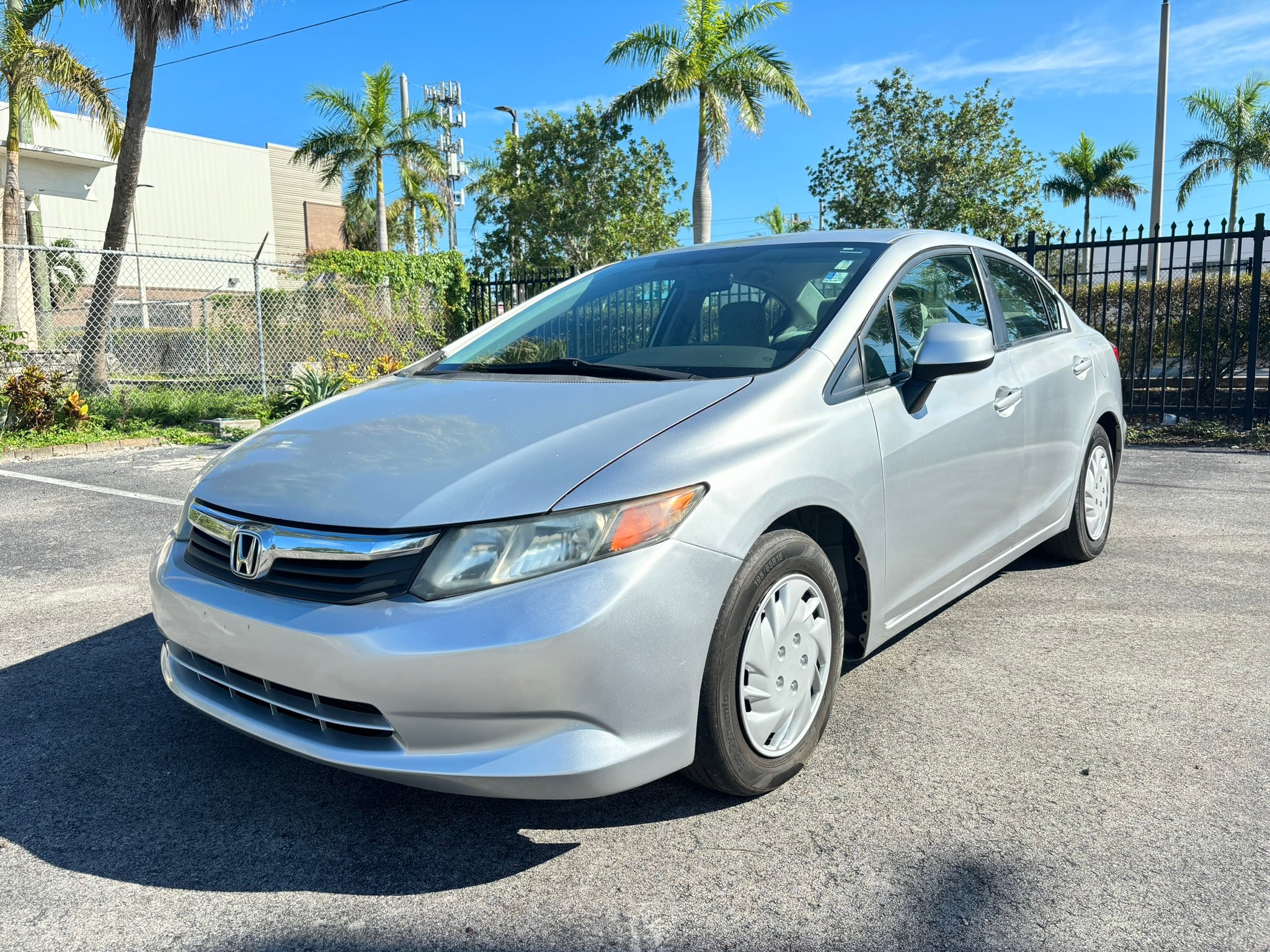 2012 Honda Civic LX rental sedan – front left angle view in Fort Lauderdale
