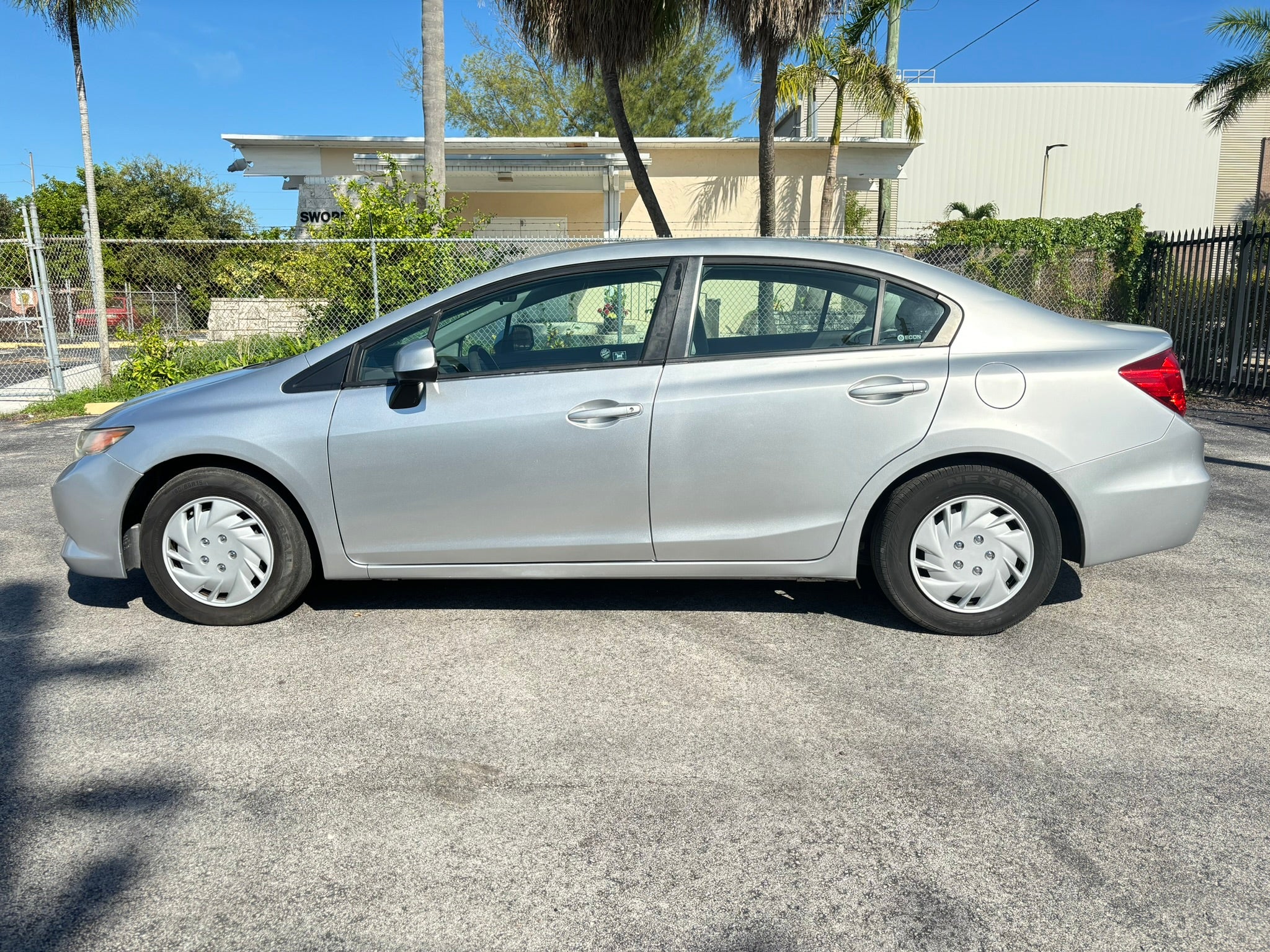 2012 Honda Civic LX – side profile view rental sedan Fort Lauderdale