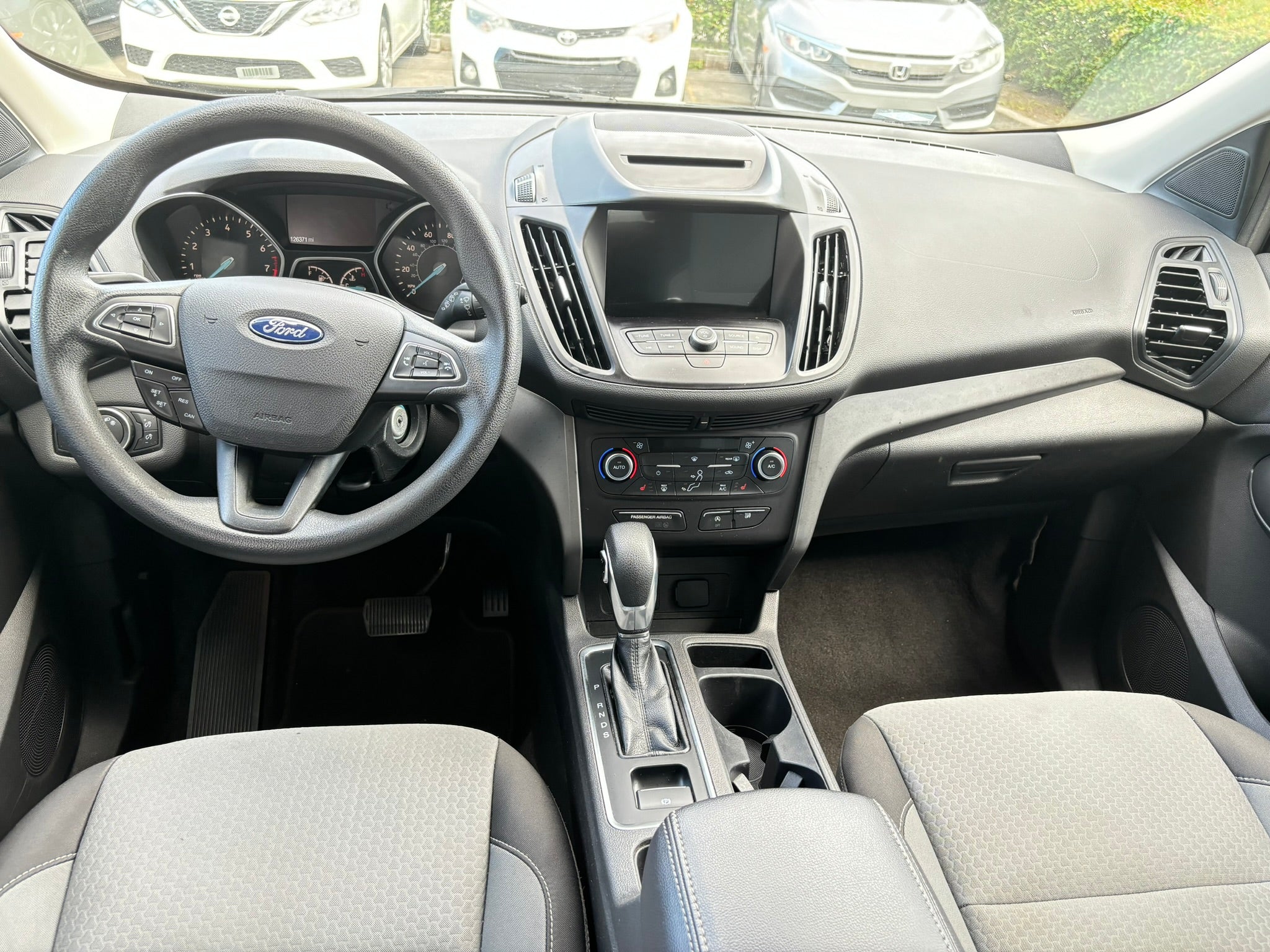 2018 Ford Escape SE interior – dashboard and steering wheel for rental