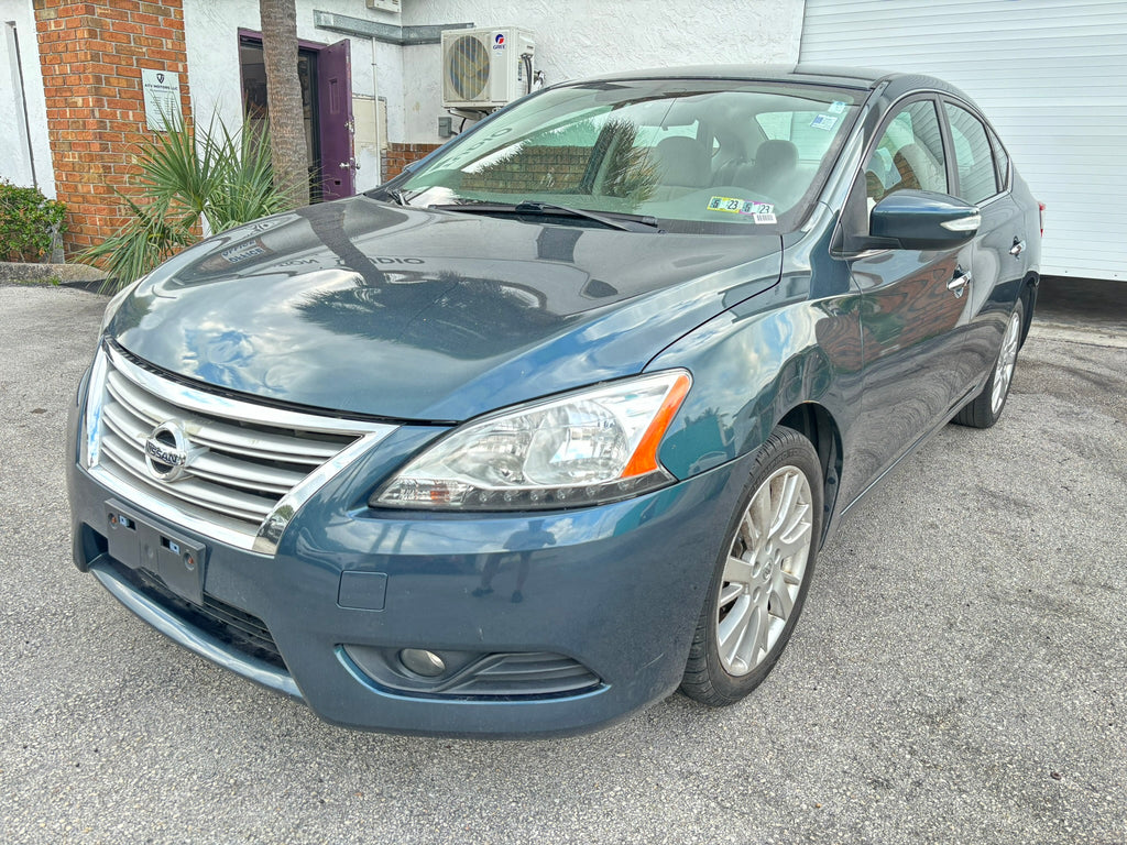 2014 Nissan Sentra S rental car – front left angle view in Fort Lauderdale