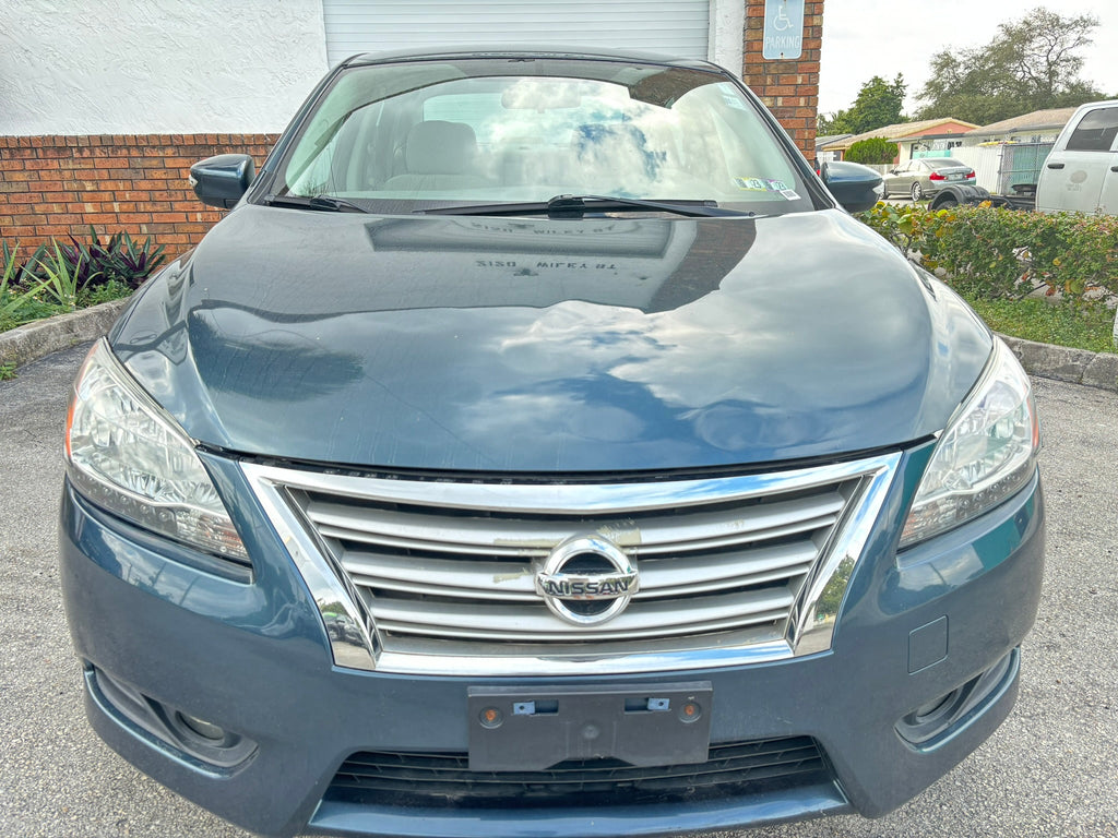 2014 Nissan Sentra S – front view, clean rental car Florida