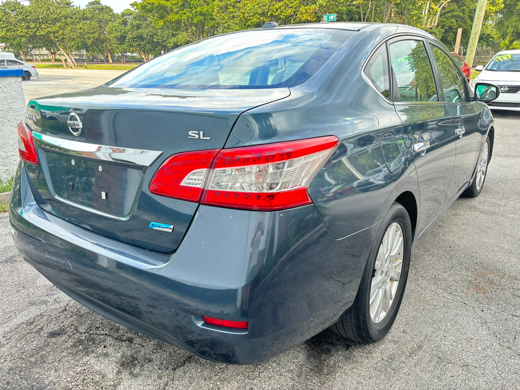 2014 Nissan Sentra S – rear right angle view, affordable rental car Florida