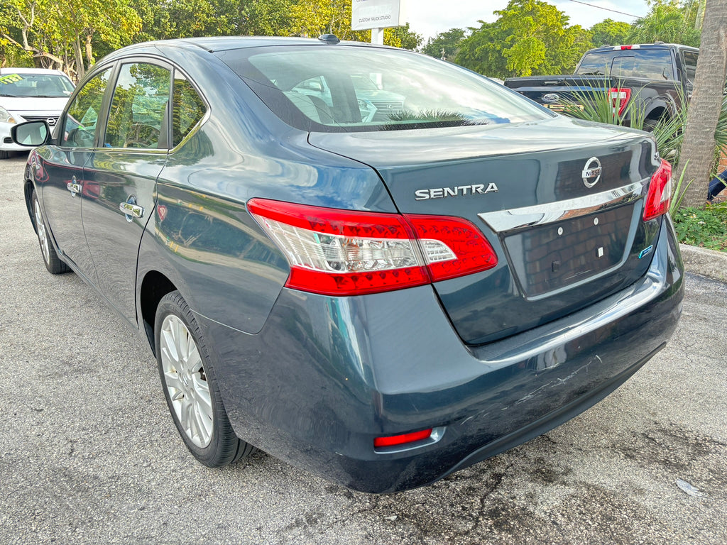 2014 Nissan Sentra S – rear left angle, Florida rental car