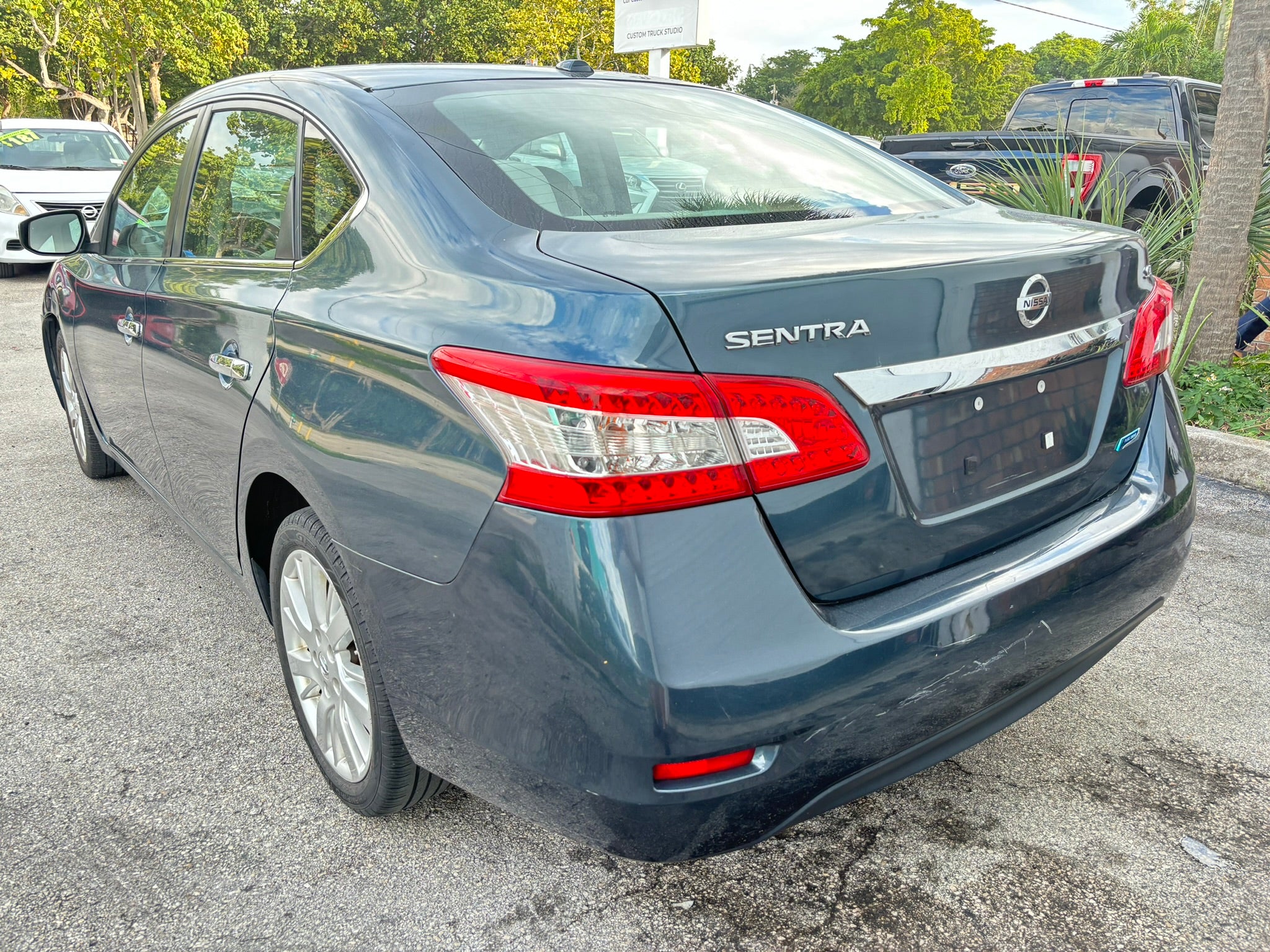 2014 Nissan Sentra S – rear left angle, Florida rental car