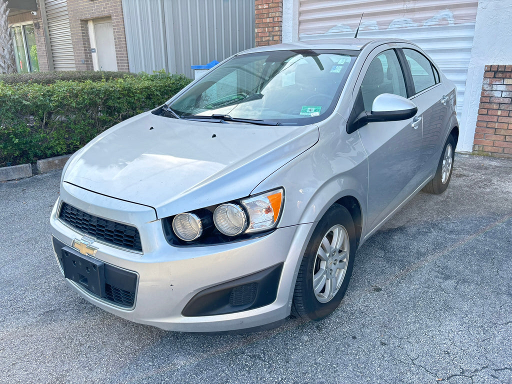 2012 Chevrolet Sonic LT rental car – front left angle view in Fort Lauderdale