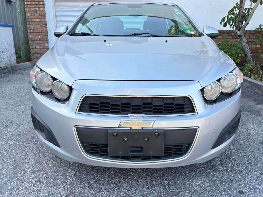 2012 Chevrolet Sonic LT – front view, clean rental car Florida