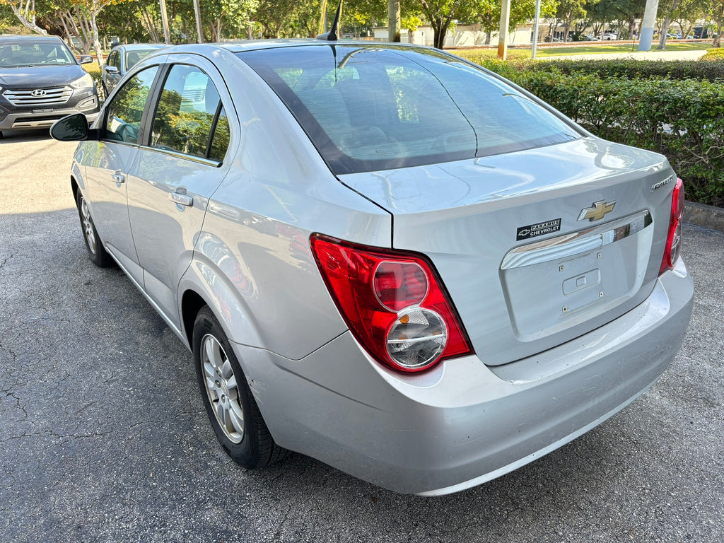 2012 Chevrolet Sonic LT – rear left angle rental car in Florida