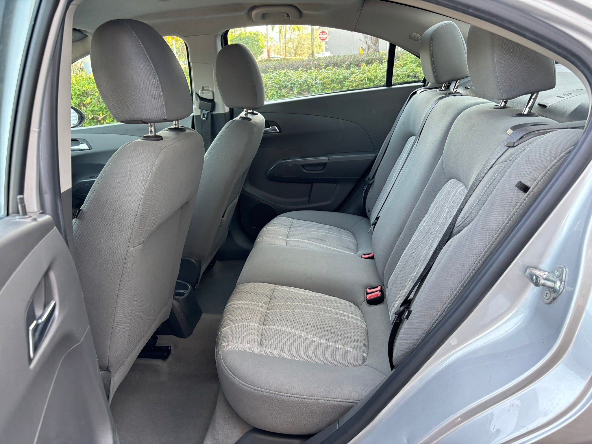 2012 Chevrolet Sonic LT interior – rear seats, compact rental car Florida