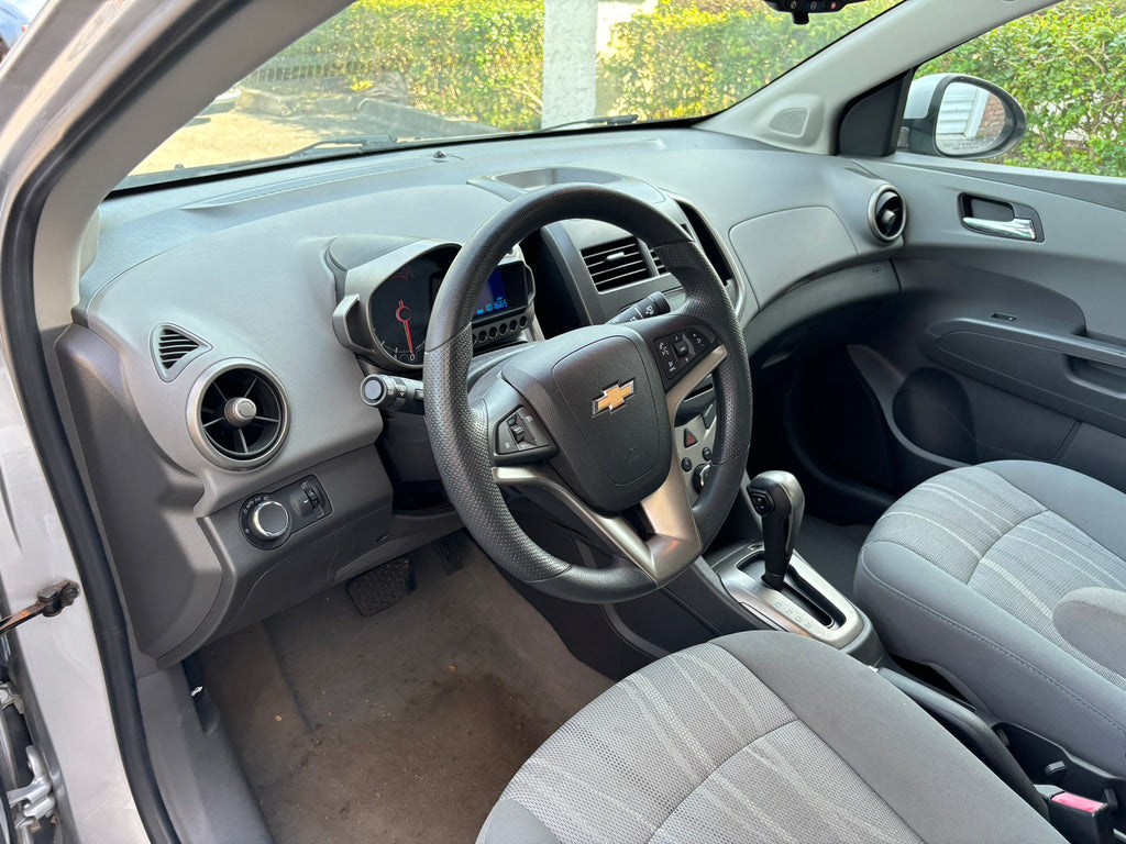 2012 Chevrolet Sonic LT interior – front seats and center console