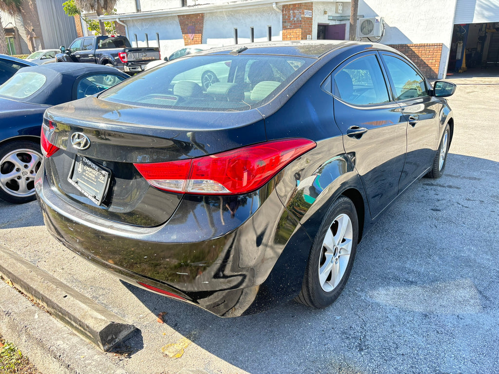 2013 Hyundai Elantra GLS – rear right angle, affordable rental car Florida