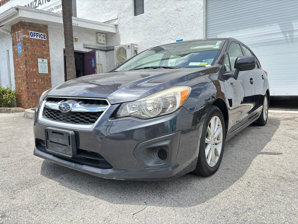 2014 Subaru Impreza 2.0i Premium rental car – front left angle view in Fort Lauderdale