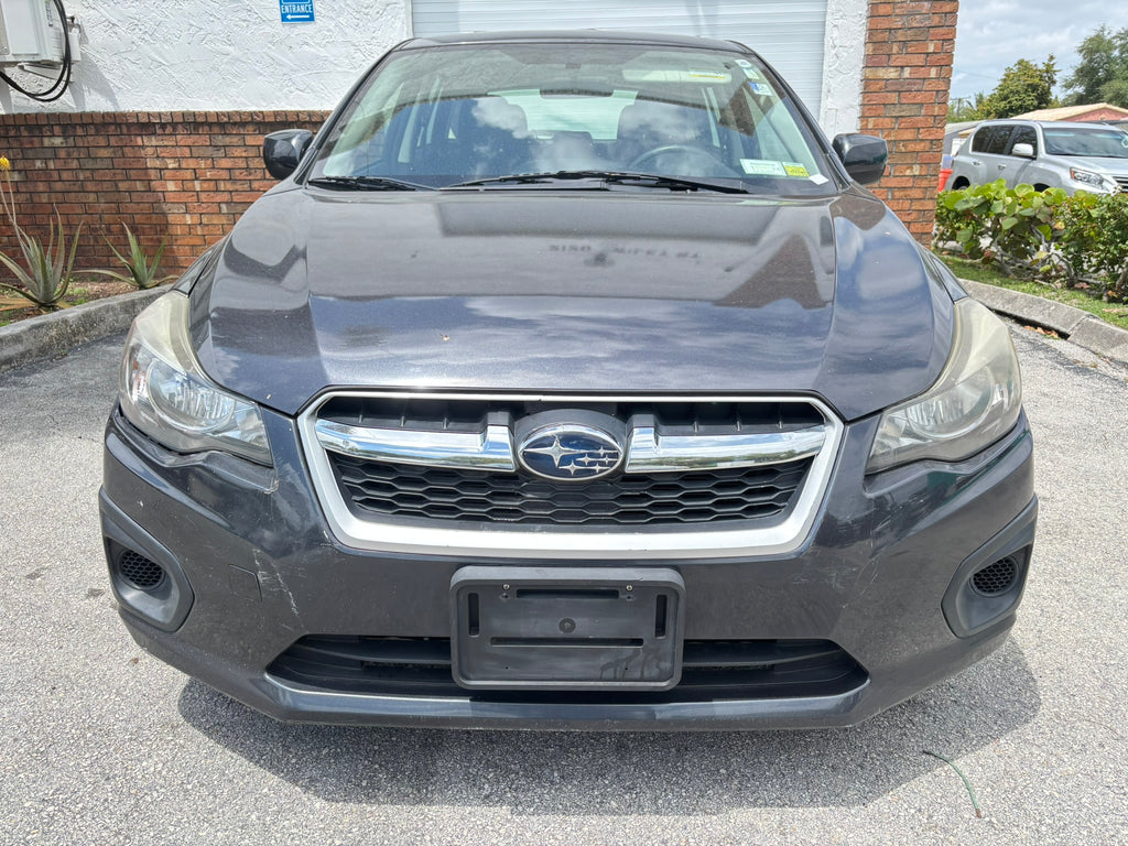 2014 Subaru Impreza 2.0i Premium – front view, clean rental car Florida