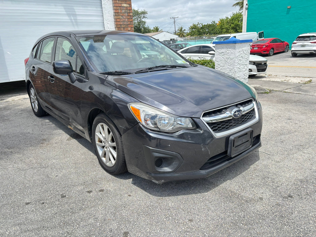 2014 Subaru Impreza 2.0i Premium – front right angle rental vehicle Fort Lauderdale