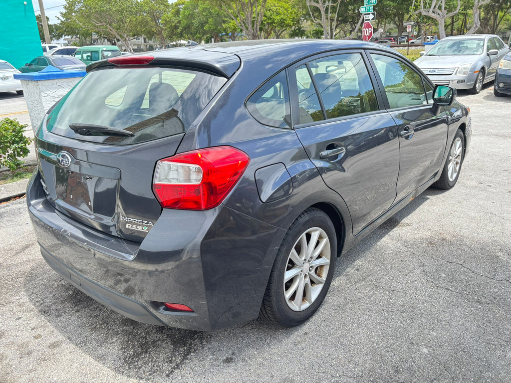 2014 Subaru Impreza 2.0i Premium – rear right angle, affordable rental car Florida