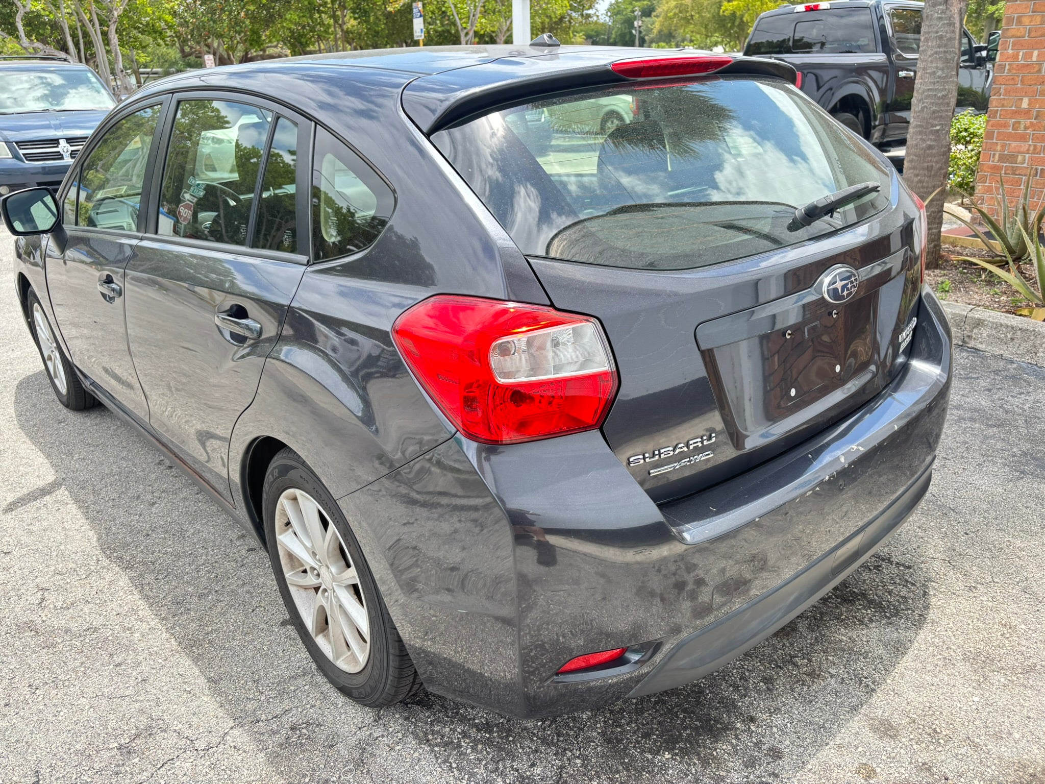 2014 Subaru Impreza 2.0i Premium – rear left angle rental car in Florida