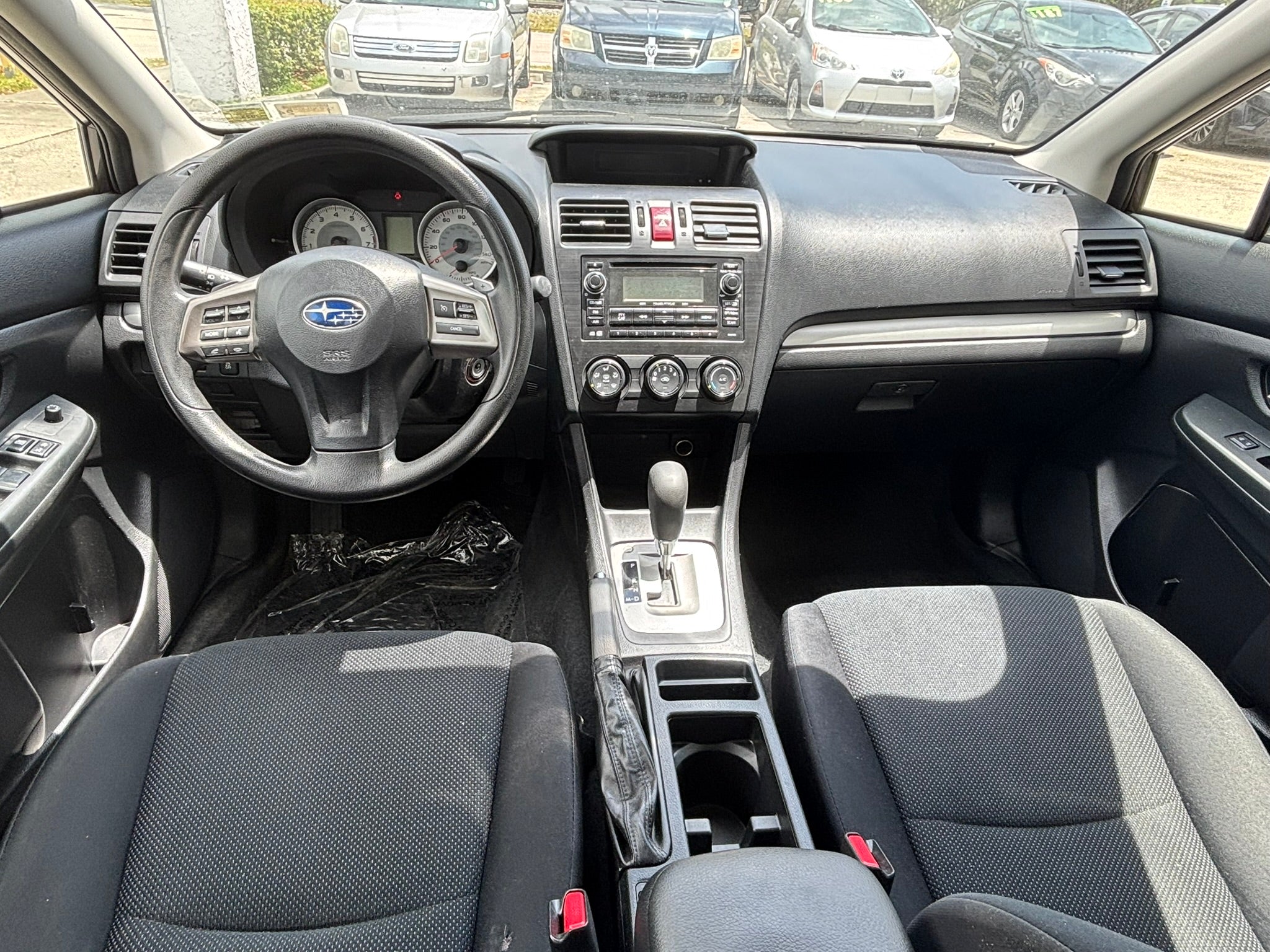 2014 Subaru Impreza 2.0i Premium interior – dashboard and steering wheel for rental