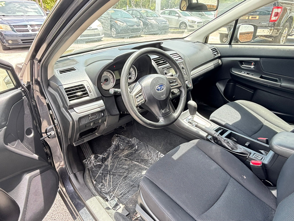 2014 Subaru Impreza 2.0i Premium interior – front seats, clean rental car Florida