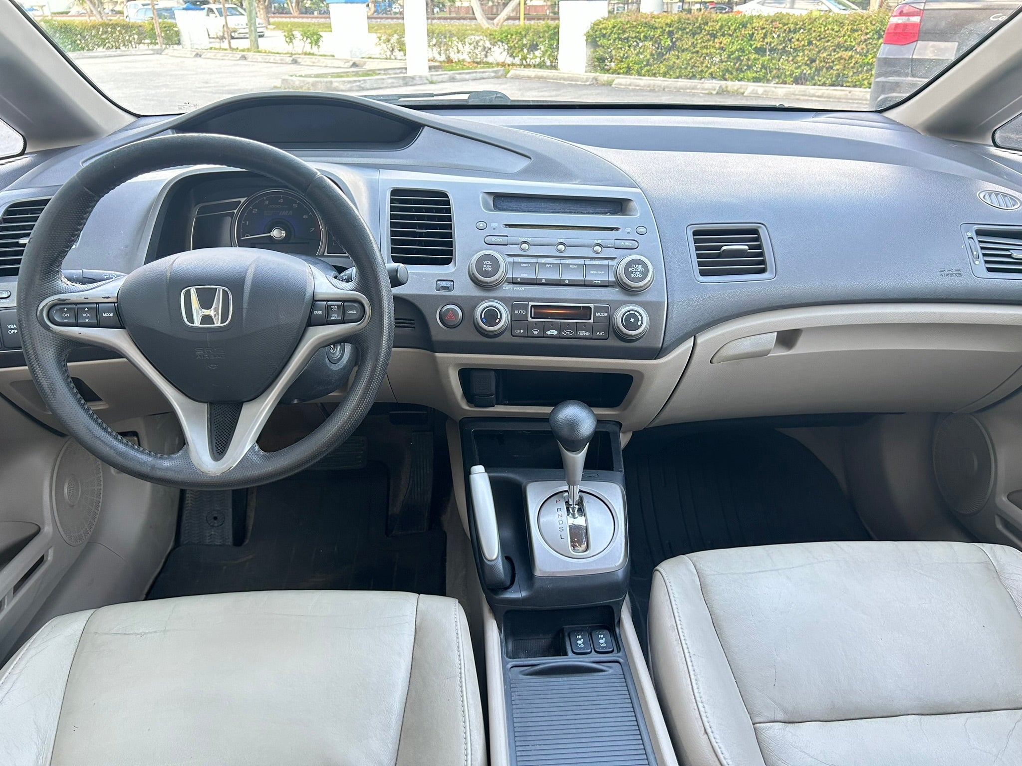 2011 Honda Civic Hybrid interior – dashboard and steering wheel for rental