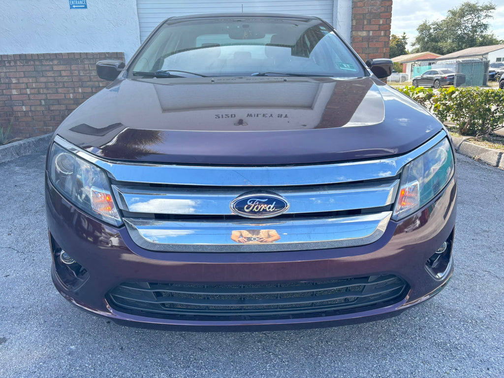 2012 Ford Fusion SE – front view, clean rental car Florida